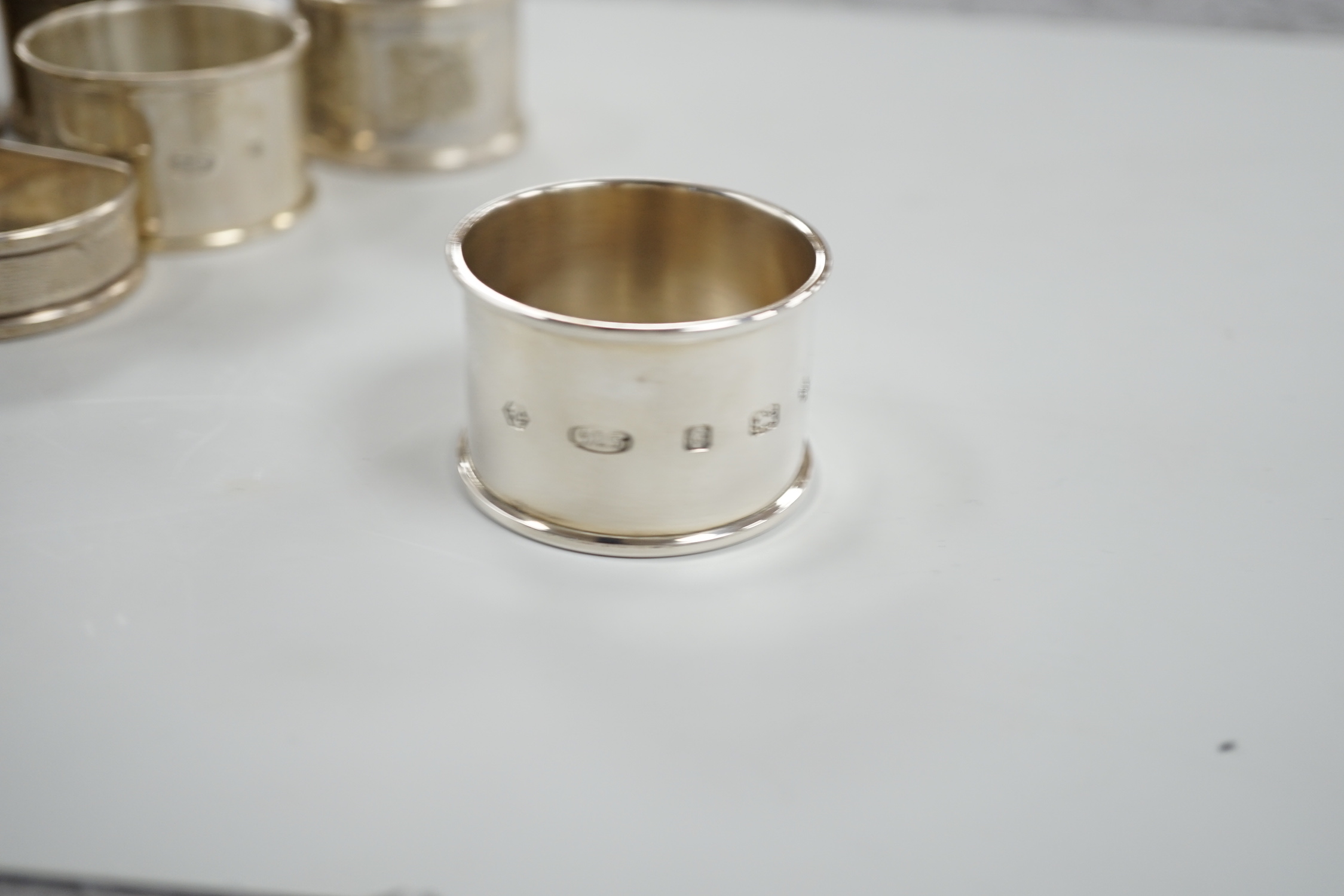Sixteen assorted silver napkin rings, various dates and makers.